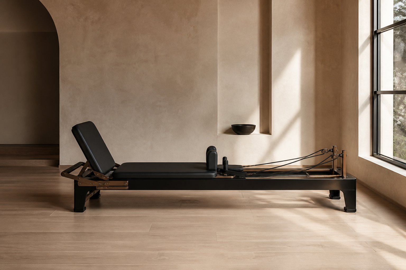 Placeholder: Pilates reformer in a cream boutique studio